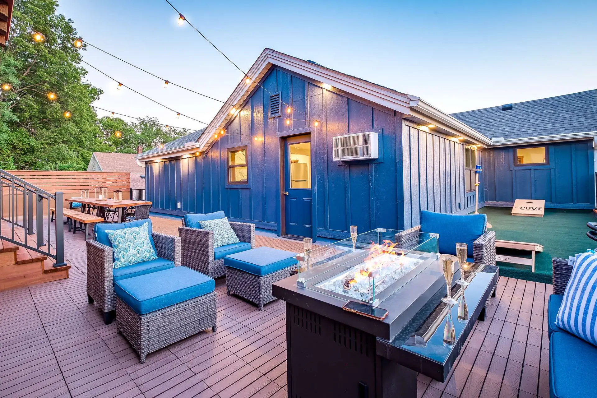 Rooftop patio with fire table at The Cove