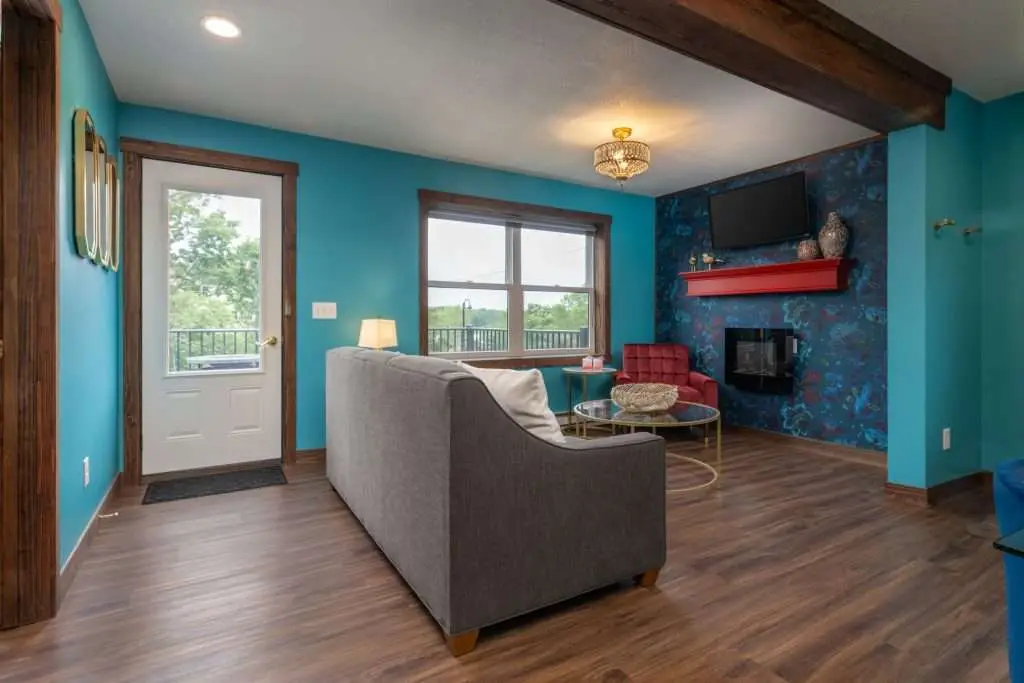 Living room with sofa and electric fireplace