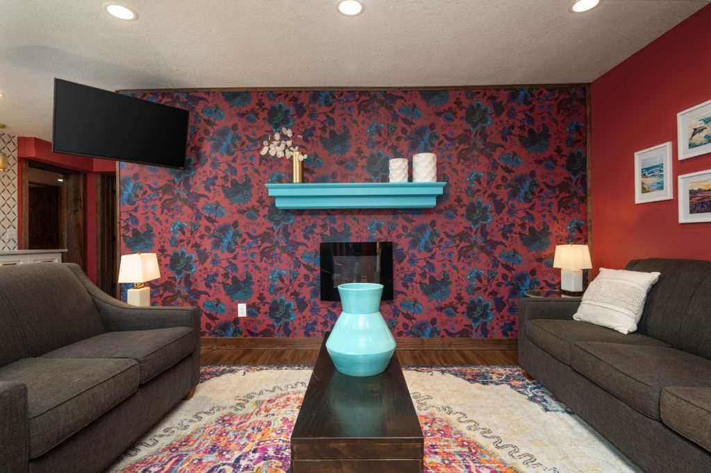 Electric fireplace with teal mantel
