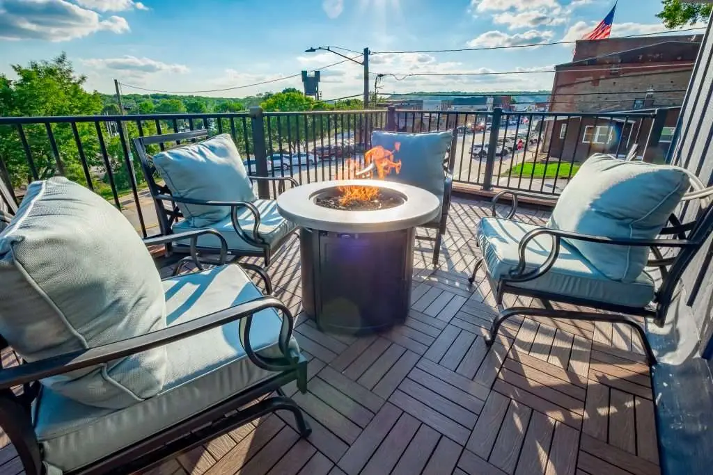 Private deck with fire table and cushioned seating